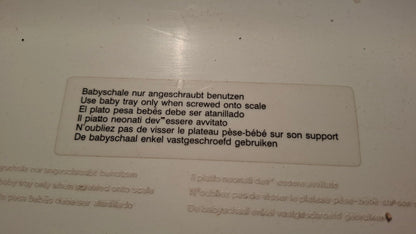 Soehnle Babyschale mit Sicherheitshinweis zur Verschraubung
