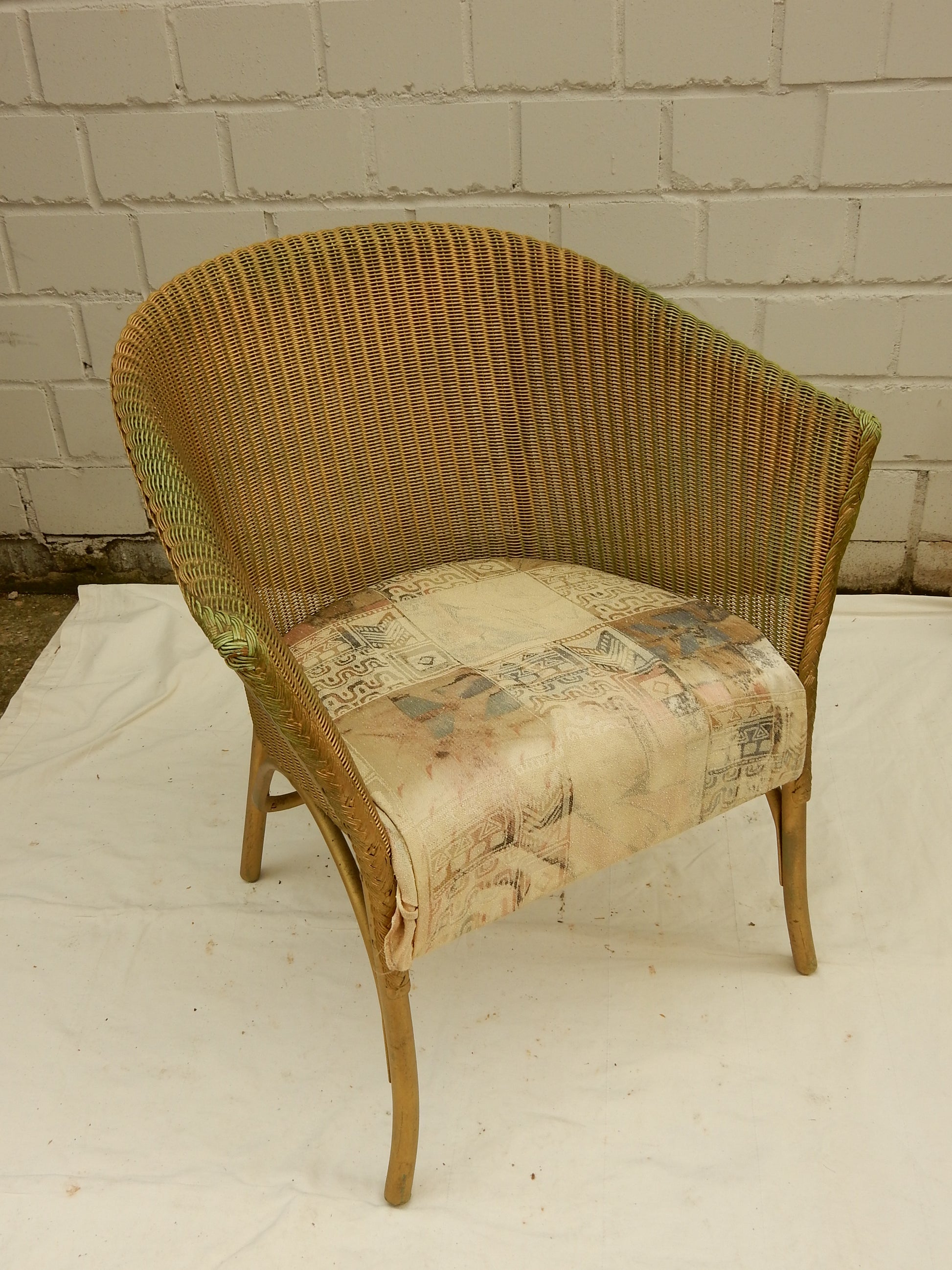 Original Lloyd Loom „Lusty“ Sessel – England, Vintage Flechtsessel mit Kissen - Artikelbild von Fummel & Gedöns Secondhand-Store