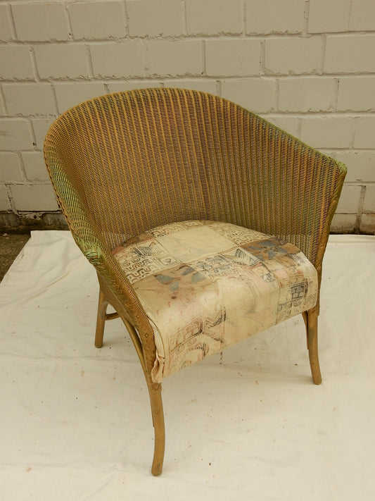 Original Lloyd Loom „Lusty“ Sessel – England, Vintage Flechtsessel mit Kissen
