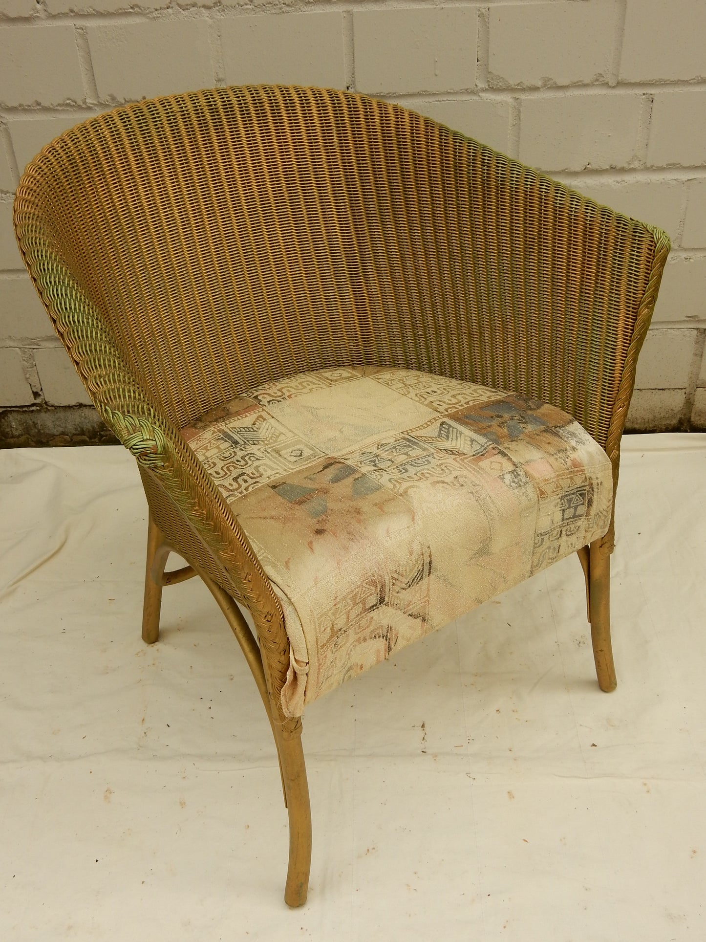 Original Lloyd Loom „Lusty“ Sessel – England, Vintage Flechtsessel mit Kissen