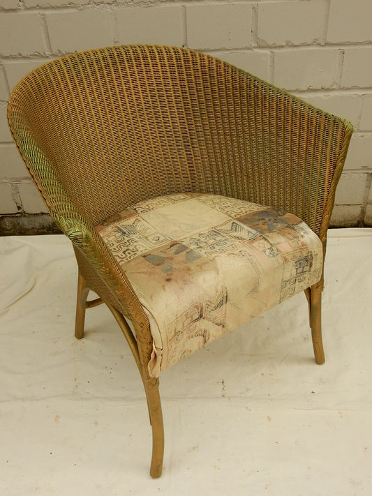 Original Lloyd Loom „Lusty“ Sessel – England, Vintage Flechtsessel mit Kissen